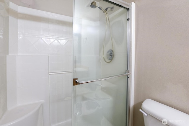 1404 102nd St E, Tacoma, WA 98445 - full bathroom with a shower with door and toilet