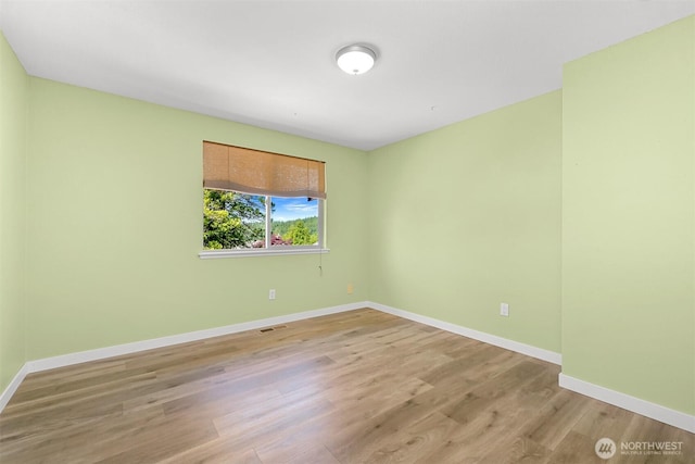 801 38th St, Bellingham, WA 98229 - empty room with wood finished floors and baseboards