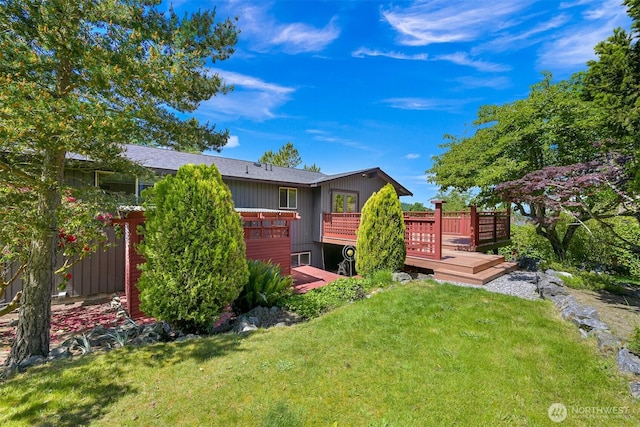 801 38th St, Bellingham, WA 98229 - rear view of house with a wooden deck and a yard