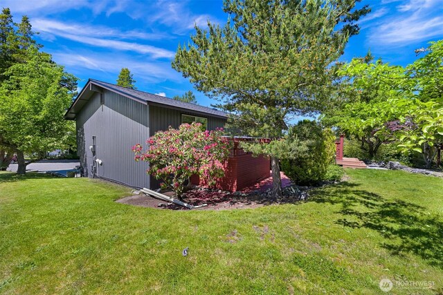 801 38th St, Bellingham, WA 98229 - view of side of home featuring a yard and an outdoor structure