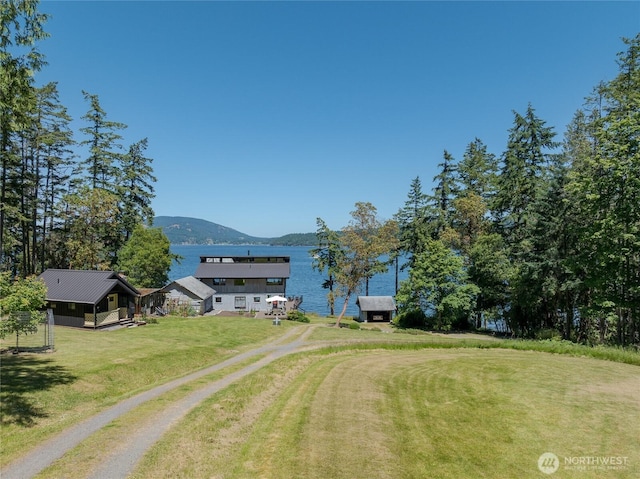 187 Serendipity Ln, Shaw Island, WA 98286 - view of grassy yard featuring driveway and a water and mountain view