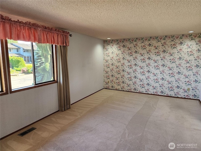 10622 44th Ave SE, Everett, WA 98208 - unfurnished room featuring light colored carpet and a textured ceiling