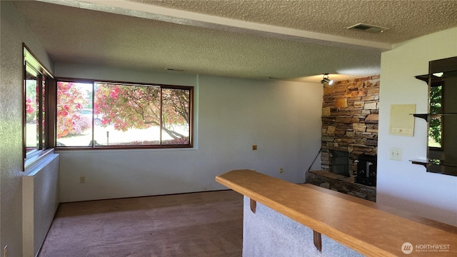 10622 44th Ave SE, Everett, WA 98208 - unfurnished living room with carpet floors and a textured ceiling