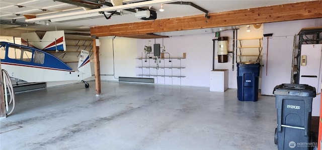 10622 44th Ave SE, Everett, WA 98208 - garage featuring a central vacuum unit and a garage door opener