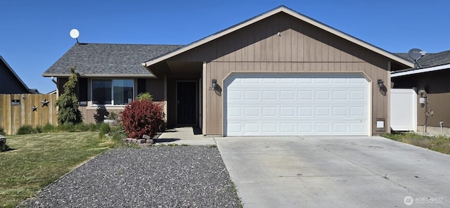 1175 E Cypress St, Othello, WA 99344 - single story home with an attached garage, driveway, and a shingled roof