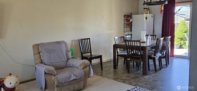 1175 E Cypress St, Othello, WA 99344 - dining space with baseboards