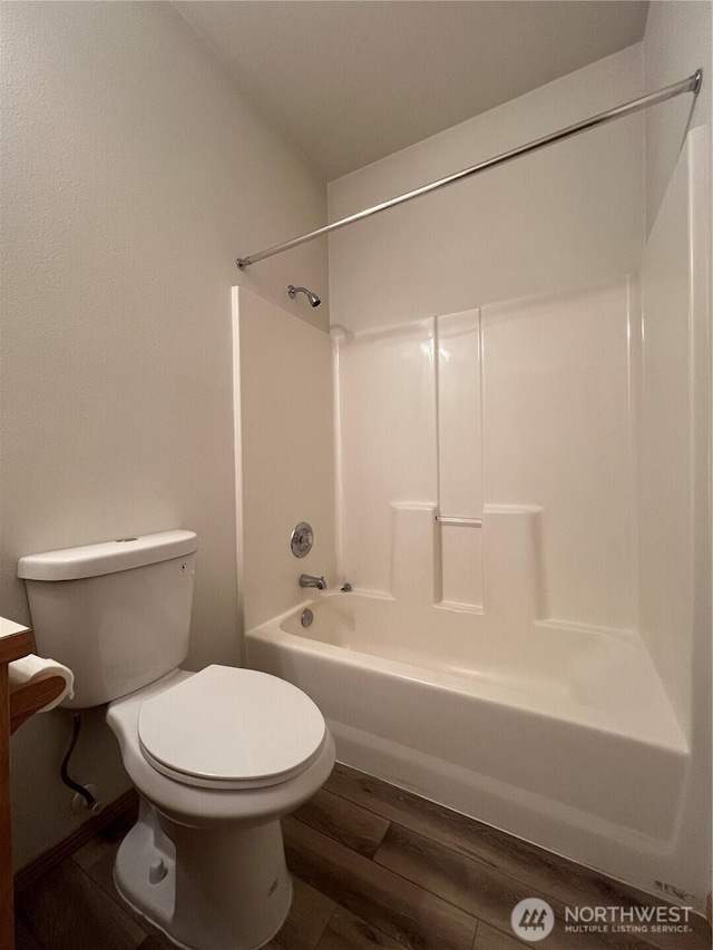 15121 148th St E, Orting, WA 98360 - bathroom with bathing tub / shower combination and wood finished floors