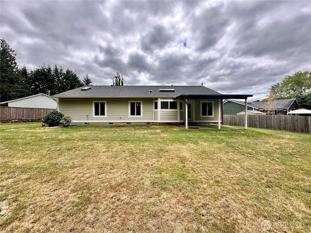 15121 148th St E, Orting, WA 98360 - rear view of house with crawl space and a patio