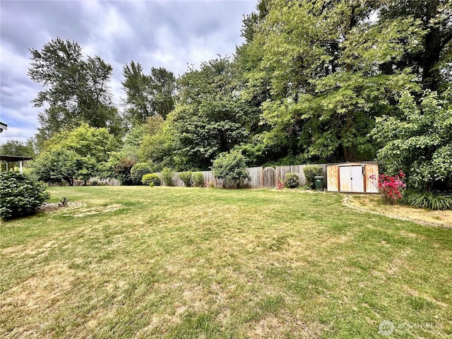 15121 148th St E, Orting, WA 98360 - view of yard featuring a storage unit