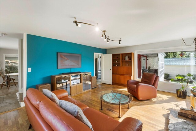 3804 Olympic Blvd W, University Place, WA 98466 - living room featuring wood finished floors
