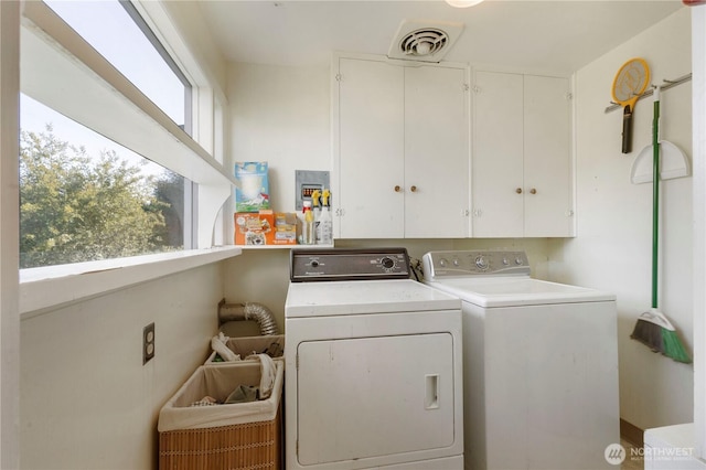 3804 Olympic Blvd W, University Place, WA 98466 - laundry area featuring cabinet space and washer and clothes dryer