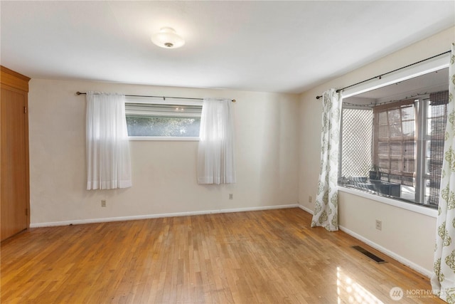 3804 Olympic Blvd W, University Place, WA 98466 - spare room with light wood-style flooring and baseboards