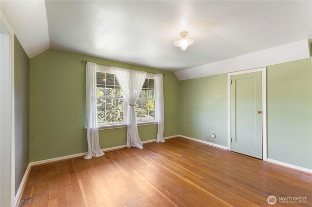 3804 Olympic Blvd W, University Place, WA 98466 - bonus room with lofted ceiling, wood-type flooring, and baseboards