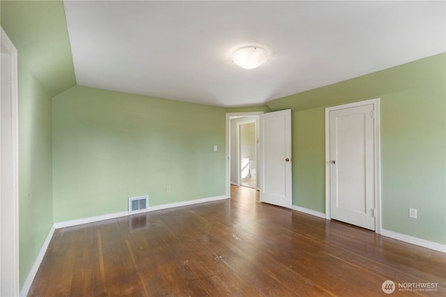 3804 Olympic Blvd W, University Place, WA 98466 - unfurnished bedroom with hardwood / wood-style floors, baseboards, and lofted ceiling