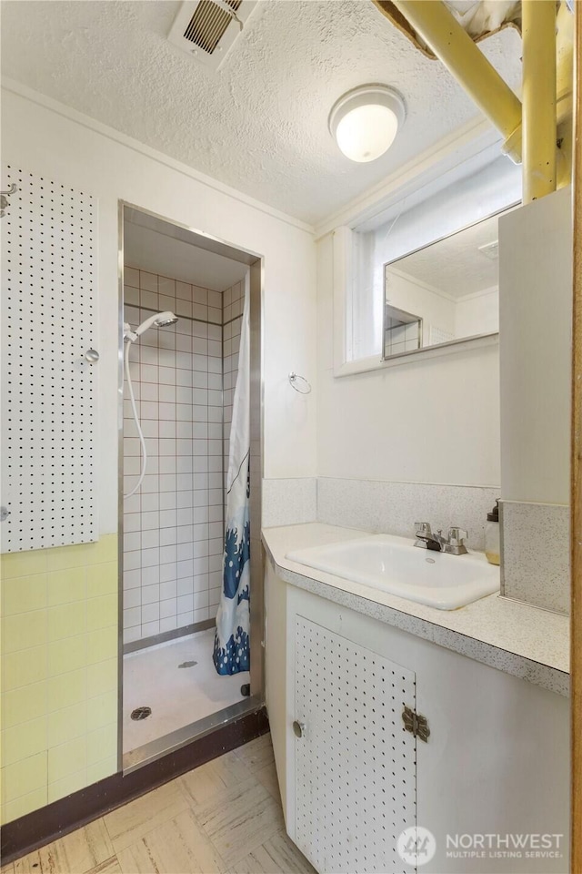 3804 Olympic Blvd W, University Place, WA 98466 - full bath with a shower stall, vanity, and a textured ceiling
