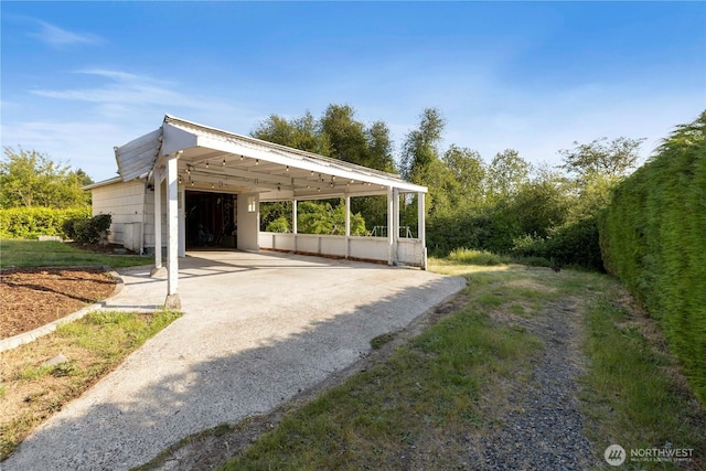 3804 Olympic Blvd W, University Place, WA 98466 - view of car parking with driveway and a carport