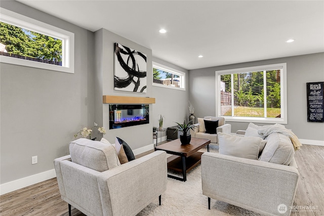 10617 Rosewood Ave Unit A, Everett, WA 98204 - living area with healthy amount of natural light, baseboards, recessed lighting, and light wood-style floors