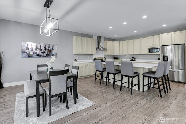 10617 Rosewood Ave Unit A, Everett, WA 98204 - dining space featuring recessed lighting, light wood finished floors, and baseboards