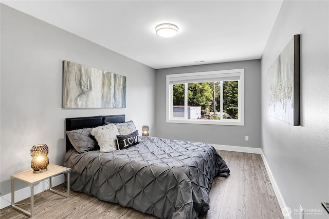 10617 Rosewood Ave Unit A, Everett, WA 98204 - bedroom featuring wood finished floors and baseboards