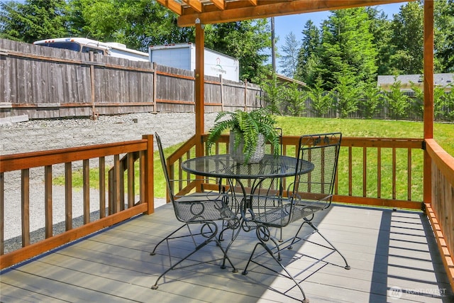 10617 Rosewood Ave Unit A, Everett, WA 98204 - deck with outdoor dining area and a pergola