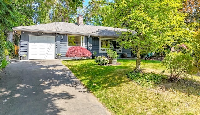 11258 29th Ave SW, Seattle, WA 98146 - view of front of property featuring driveway, a chimney, a garage, a front lawn, and a shingled roof