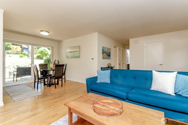11258 29th Ave SW, Seattle, WA 98146 - living area featuring light wood-type flooring and baseboards