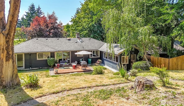 11258 29th Ave SW, Seattle, WA 98146 - back of house with a deck, a shingled roof, and a chimney