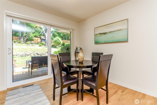 11258 29th Ave SW, Seattle, WA 98146 - dining space with light wood finished floors and baseboards