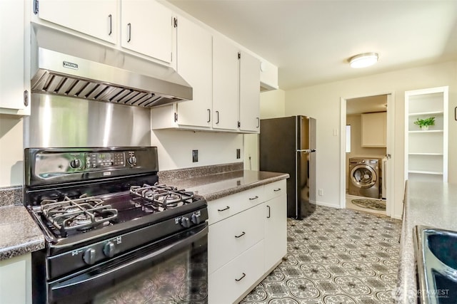 11258 29th Ave SW, Seattle, WA 98146 - kitchen featuring washer / clothes dryer, black gas range, under cabinet range hood, freestanding refrigerator, and white cabinets