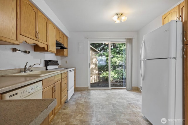 2300 9th Ave SW Unit C1, Olympia, WA 98502 - kitchen featuring white appliances, under cabinet range hood, a sink, baseboards, and stone finish floors