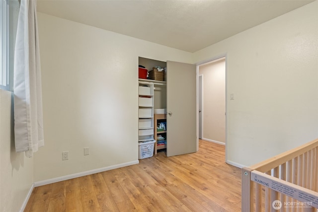 35804 15th Ave SW, Federal Way, WA 98023 - unfurnished bedroom featuring hardwood / wood-style flooring and a closet