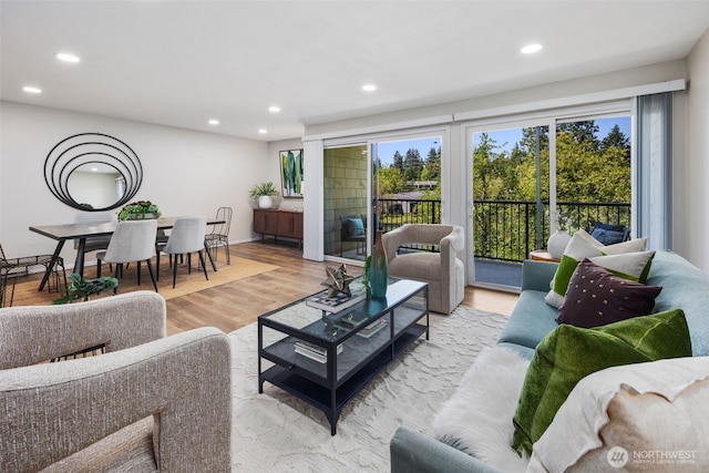 6674 138th Ave NE Unit 747, Redmond, WA 98052 - living room featuring recessed lighting, plenty of natural light, and light wood-style flooring