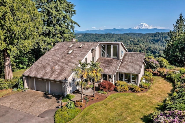 20219 SE 344th St, Auburn, WA 98092 - view of front facade featuring a chimney, a mountain view, driveway, and a front lawn