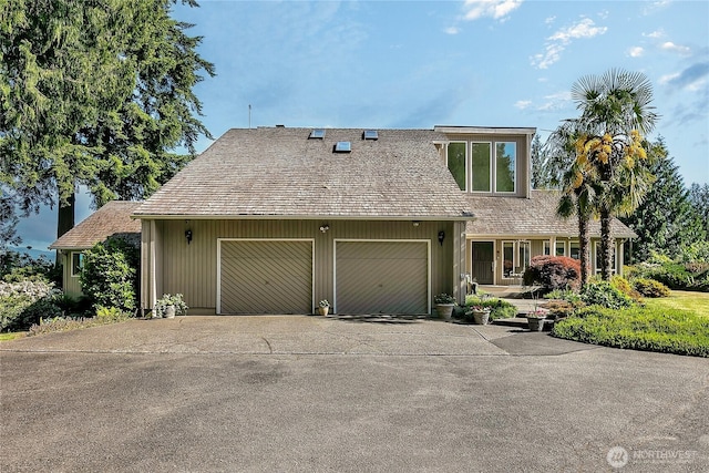20219 SE 344th St, Auburn, WA 98092 - view of front of home featuring driveway and an attached garage
