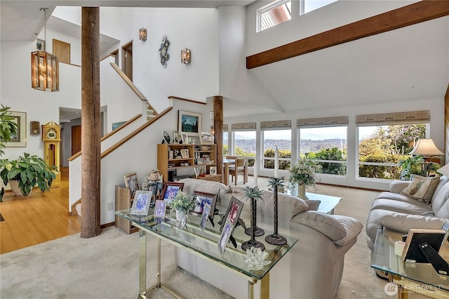 20219 SE 344th St, Auburn, WA 98092 - carpeted living room with high vaulted ceiling, stairway, and a mountain view