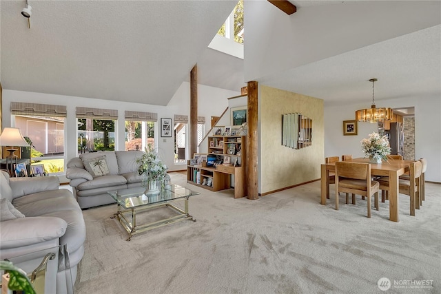 20219 SE 344th St, Auburn, WA 98092 - living area featuring high vaulted ceiling, baseboards, a chandelier, carpet floors, and a textured ceiling
