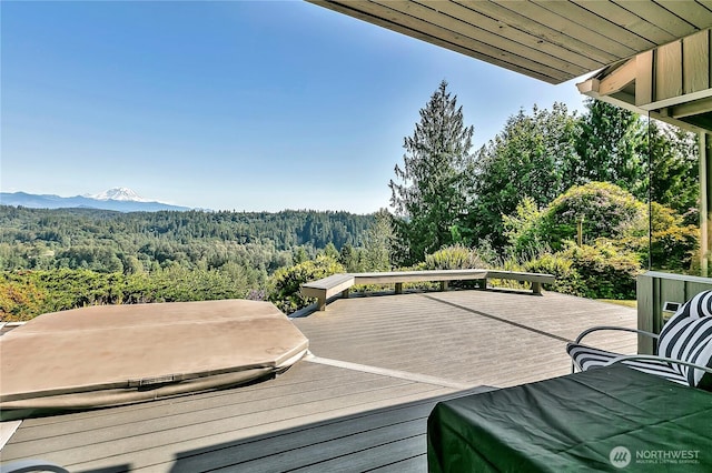 20219 SE 344th St, Auburn, WA 98092 - wooden deck with a view of trees, a covered hot tub, and a mountain view