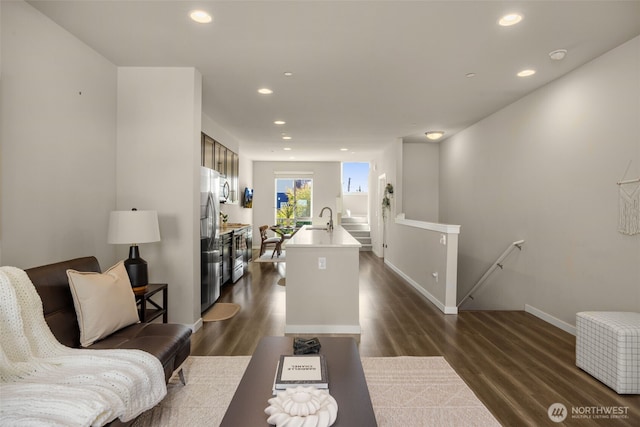 16201 Meadow Rd Unit G2, Lynnwood, WA 98087 - living area featuring recessed lighting, dark wood-style floors, and baseboards