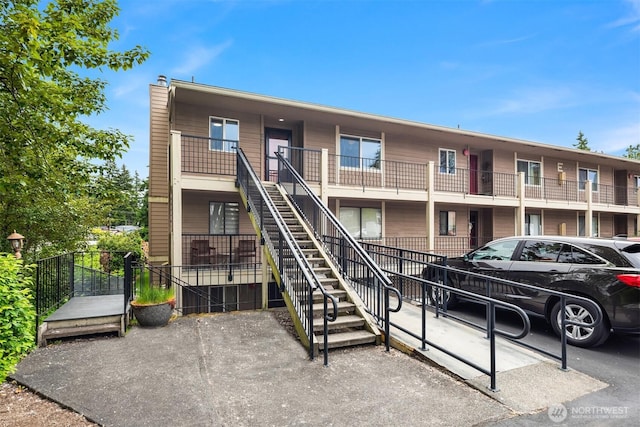 20101 61st Pl W Unit E-308, Lynnwood, WA 98036 - view of building exterior with stairs