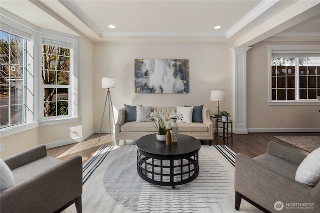 24332 NE 8th Pl, Sammamish, WA 98074 - living area with wood finished floors, healthy amount of natural light, baseboards, crown molding, and recessed lighting