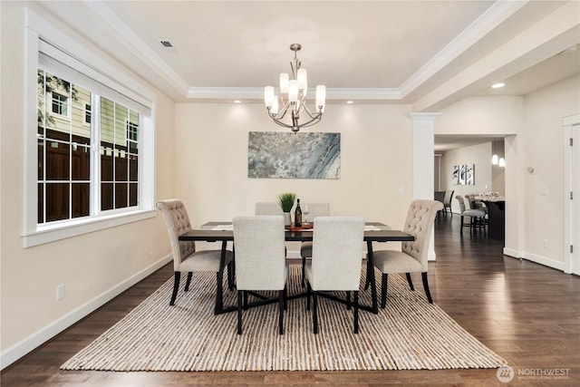 24332 NE 8th Pl, Sammamish, WA 98074 - dining area with wood finished floors, a chandelier, a tray ceiling, crown molding, and baseboards