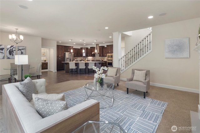 24332 NE 8th Pl, Sammamish, WA 98074 - living area with a chandelier, stairs, recessed lighting, baseboards, and carpet floors