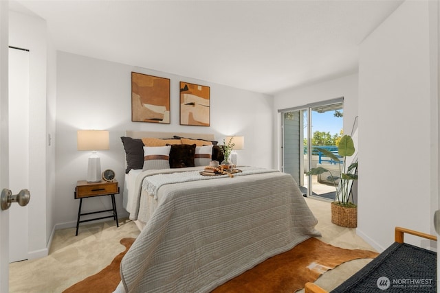2244 13th Ave W Unit 106, Seattle, WA 98119 - bedroom with access to exterior and carpet flooring