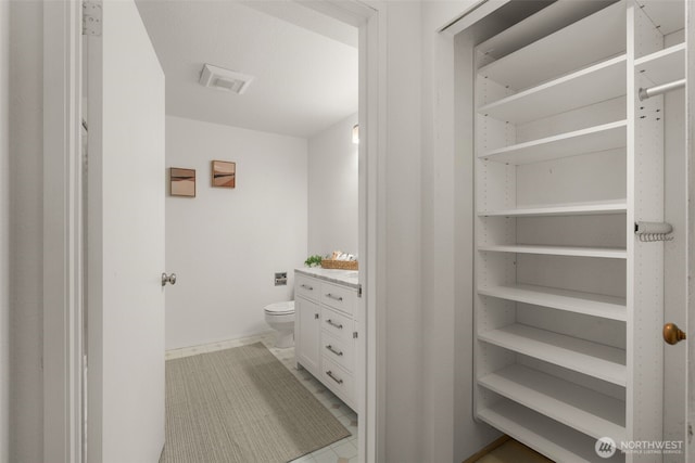2244 13th Ave W Unit 106, Seattle, WA 98119 - bathroom featuring vanity and toilet