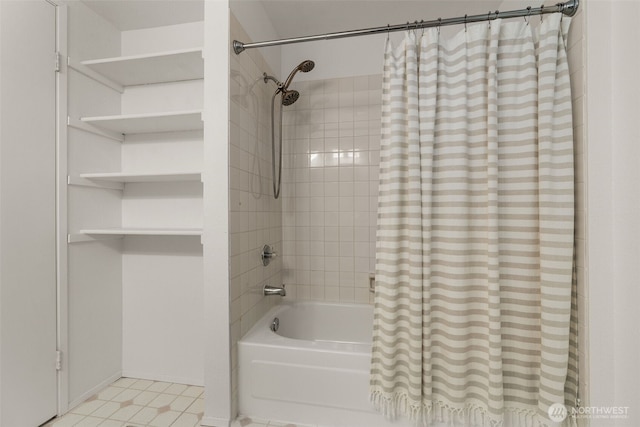 2244 13th Ave W Unit 106, Seattle, WA 98119 - bathroom featuring shower / bath combo with shower curtain and baseboards