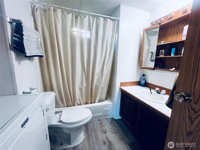 901 N Grapr Dr Unit 62, Moses Lake, WA 98837 - bathroom featuring washer / clothes dryer, vanity, wood finished floors, toilet, and shower / bath combo