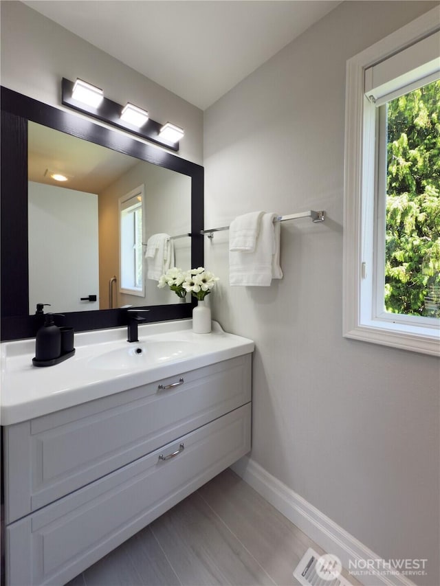 1621 Edgemoor Ln, Everett, WA 98203 - bathroom featuring vanity and baseboards