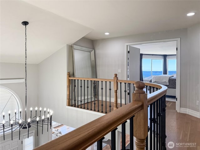 1621 Edgemoor Ln, Everett, WA 98203 - hall featuring an upstairs landing, baseboards, wood finished floors, and recessed lighting