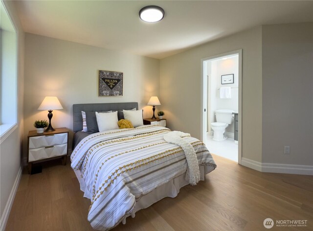 1621 Edgemoor Ln, Everett, WA 98203 - bedroom with wood finished floors, baseboards, and ensuite bathroom