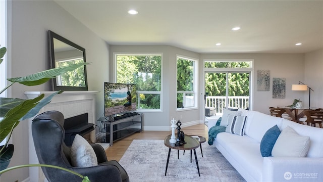 1621 Edgemoor Ln, Everett, WA 98203 - living area with wood finished floors, recessed lighting, a brick fireplace, and baseboards